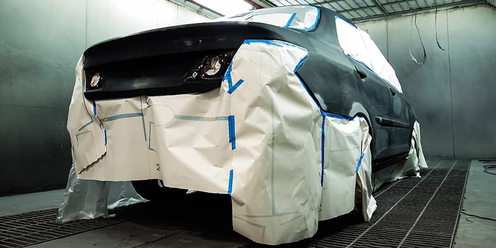 Image Of Car's Body Being Painted Black